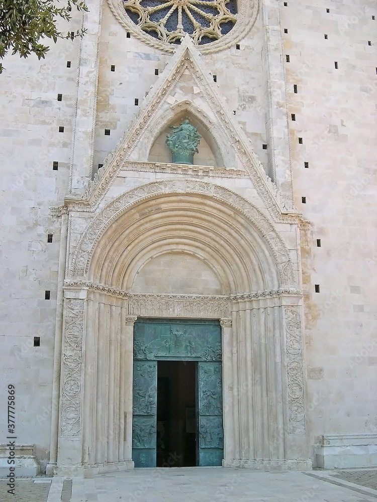 Italy, Marche, main door of Fermo Cathedral on the wide plane of Girfalco.