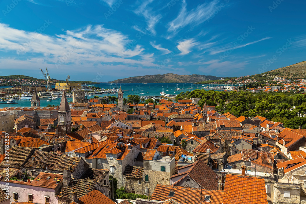 View of the old town with many tiled roofs in Trogir
