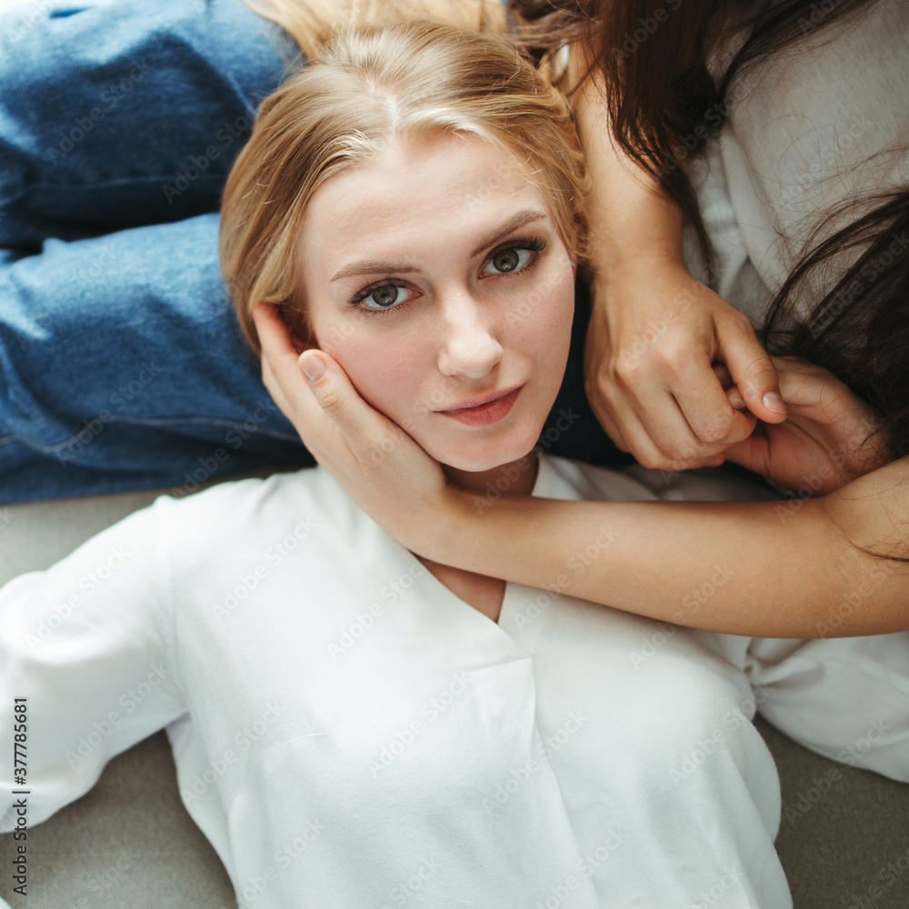 Fototapeta premium Girlfriends in love sharing time together indoors