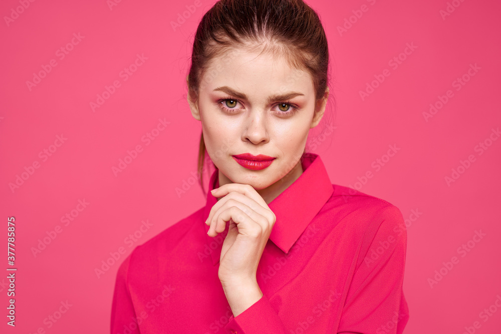 attractive girl in pink shirt cropped view bright makeup red lips gesturing with hands Copy Space attractive girl in pink shirt cropped view bright makeup red lips gesturing with hands Copy Space