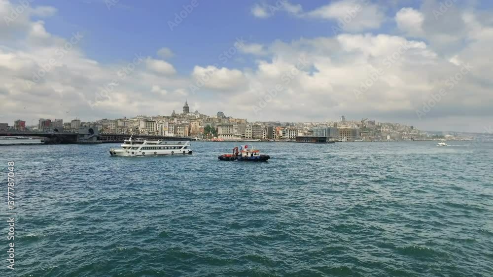 Ferry And Boats In The Bosphorus Straits at Eminou with view of Galata tower and bridge, Istanbul, Turkey Ferry And Boats In The Bosphorus Straits at Eminou with view of Galata tower and bridge, Istanbul, Turkey