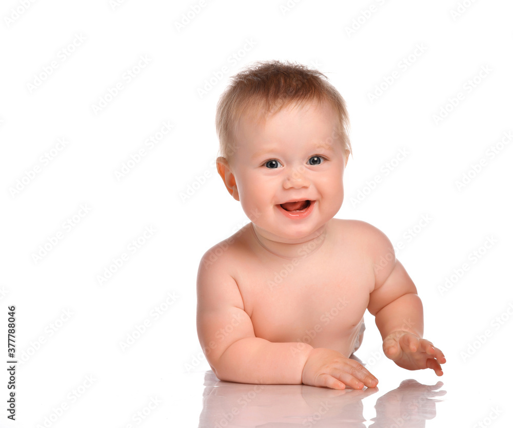 Beautiful naked baby boy posing isolated in white background. Beautiful naked baby boy posing isolated in white background.