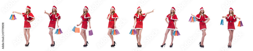 Young woman in red santa costume on white Young woman in red santa costume on white