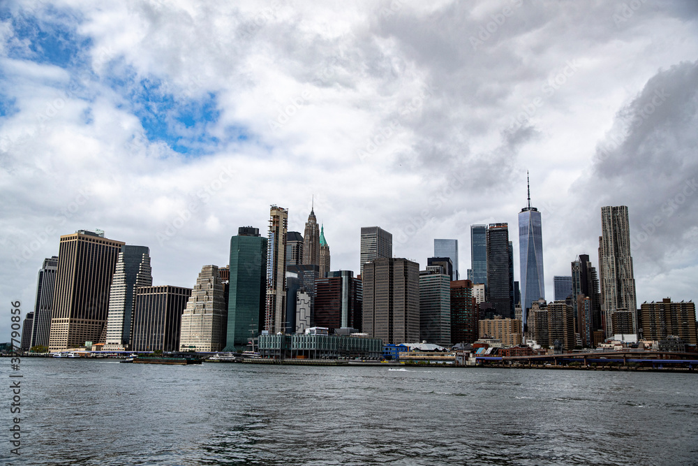 Fototapeta premium A view of lower Manhattan skyline from the East River in New York City on Sunday, Sept. 13, 2020. (Gordon Donovan)