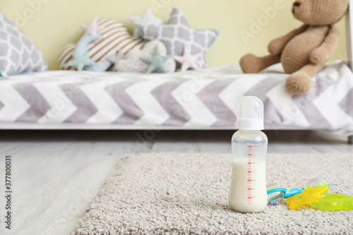 Bottle of milk for baby wit...