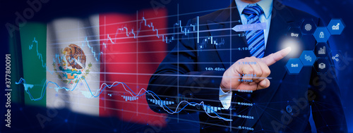 Businessman touching data analytics process system with KPI financial charts, dashboard of stock and marketing on virtual interface. With Mexico flag in background.