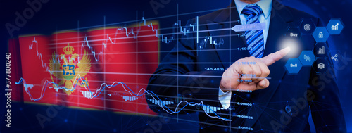 Businessman touching data analytics process system with KPI financial charts, dashboard of stock and marketing on virtual interface. With Montenegro flag in background. © TexBr