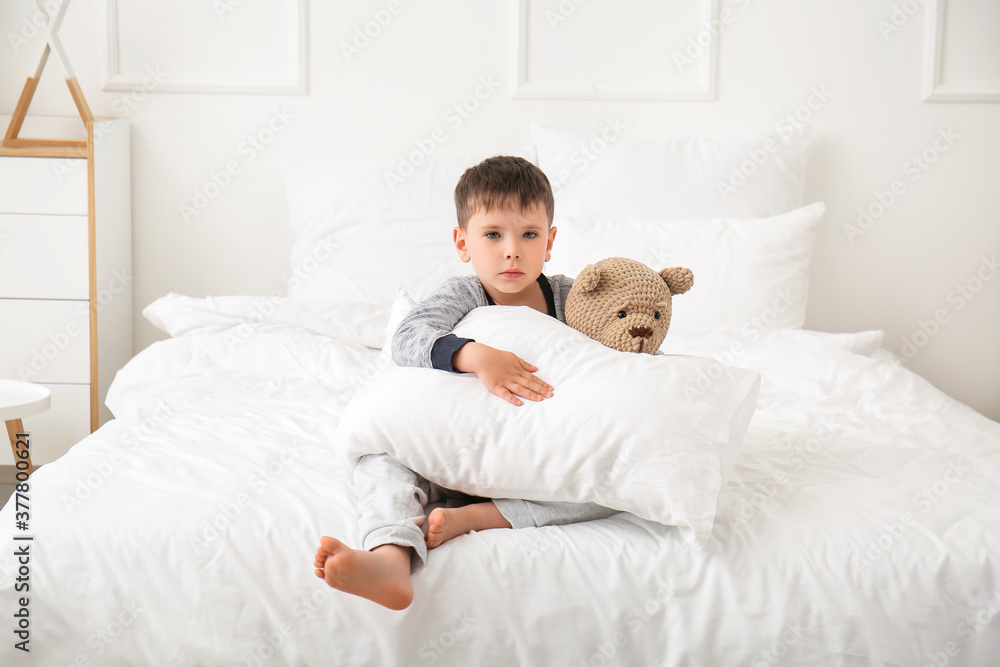 Little boy suffering from sleep disorder in bedroom Little boy suffering from sleep disorder in bedroom