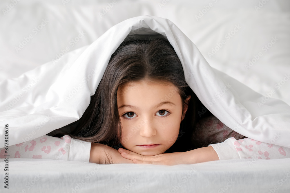 Little girl suffering from sleep disorder in bedroom Little girl suffering from sleep disorder in bedroom