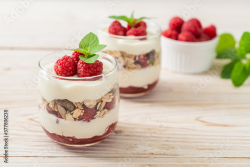 fresh raspberry and yogurt with granola