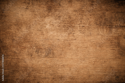 Old grunge dark textured wooden background , The surface of the old brown wood texture , top view teak wood paneling. photo