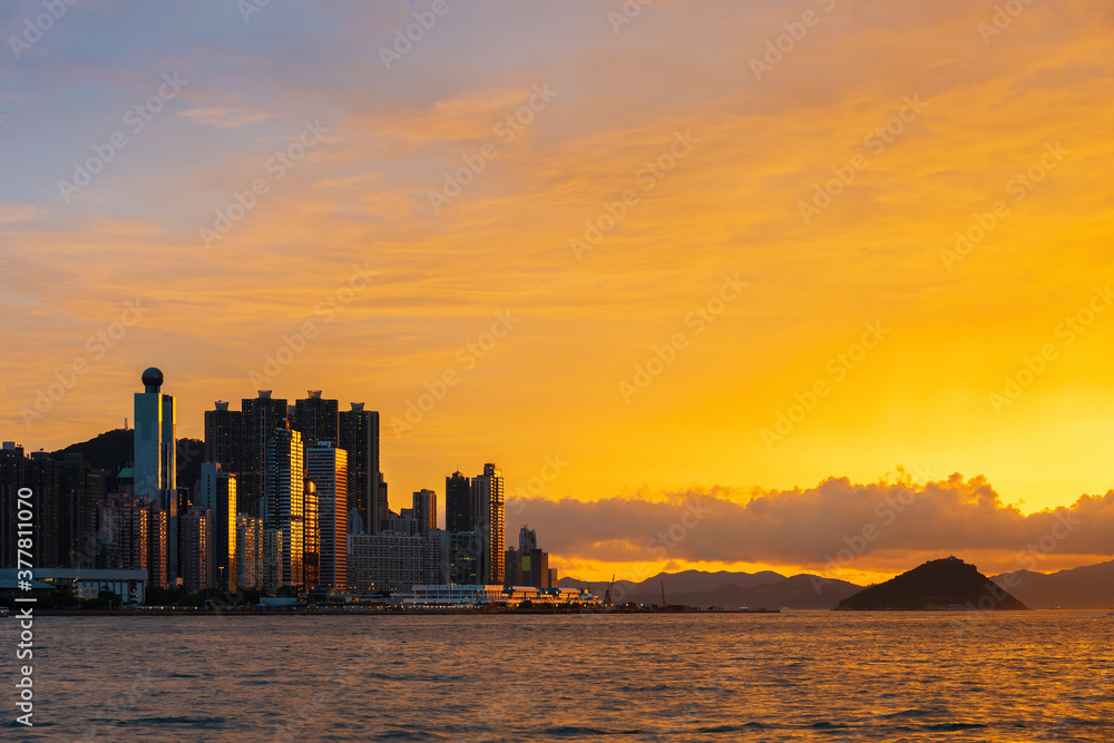 Skyline of downtown district of Hong Kong city under sunset