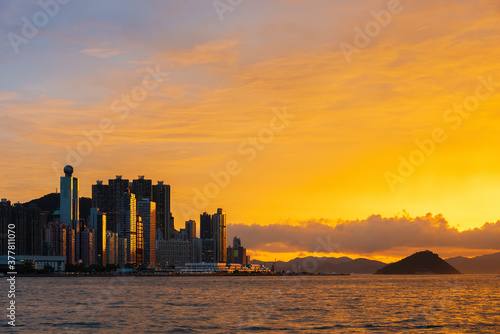 Skyline of downtown district of Hong Kong city under sunset