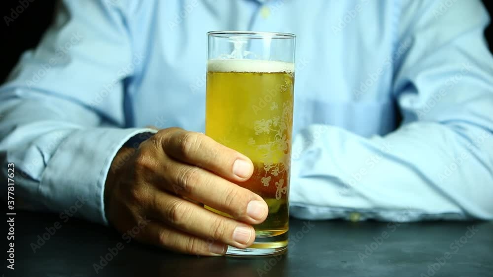 Man drinking beer , in studio Chiangmai Thailand Man drinking beer , in studio Chiangmai Thailand