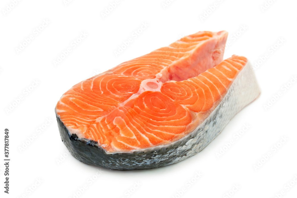 Fresh red salmon fish steak on the white background Fresh red salmon fish steak on the white background