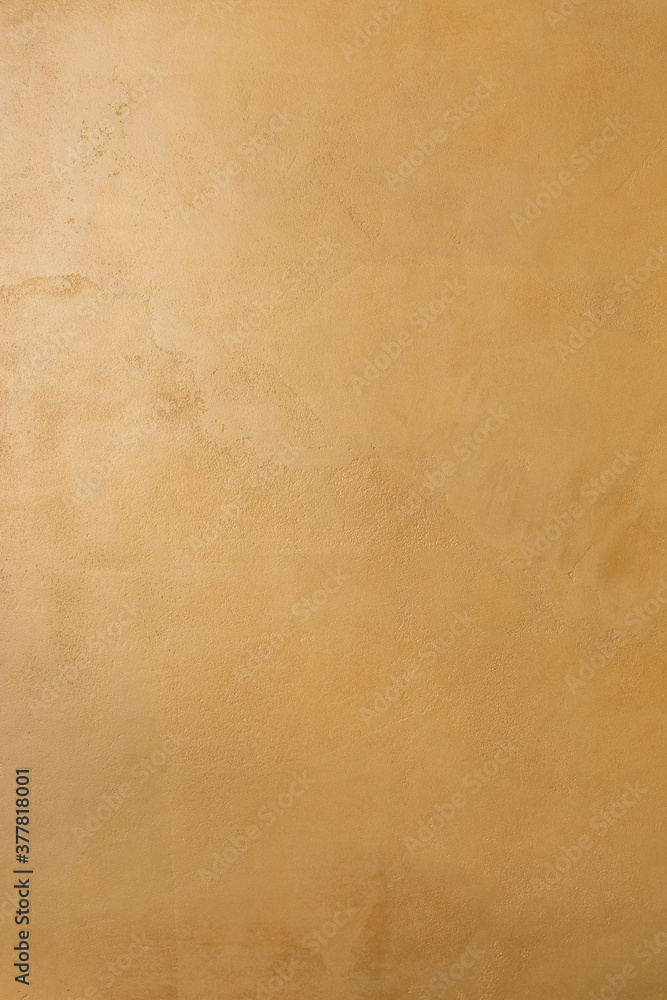 Mustard color microcement texture background