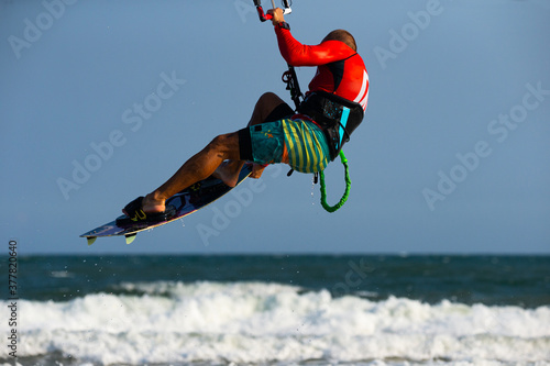 Kitesurfer In Action one foot