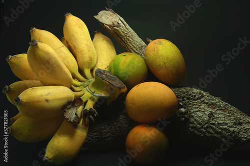 Art background coconut, banana, spoon, dish