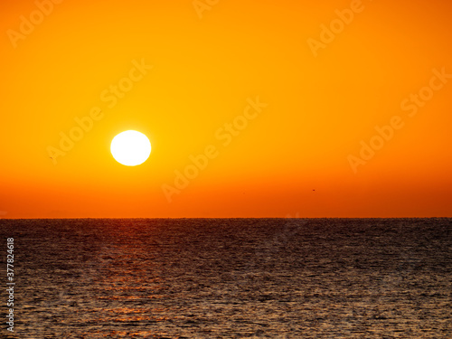 Sunrise over sea © Voyagerix