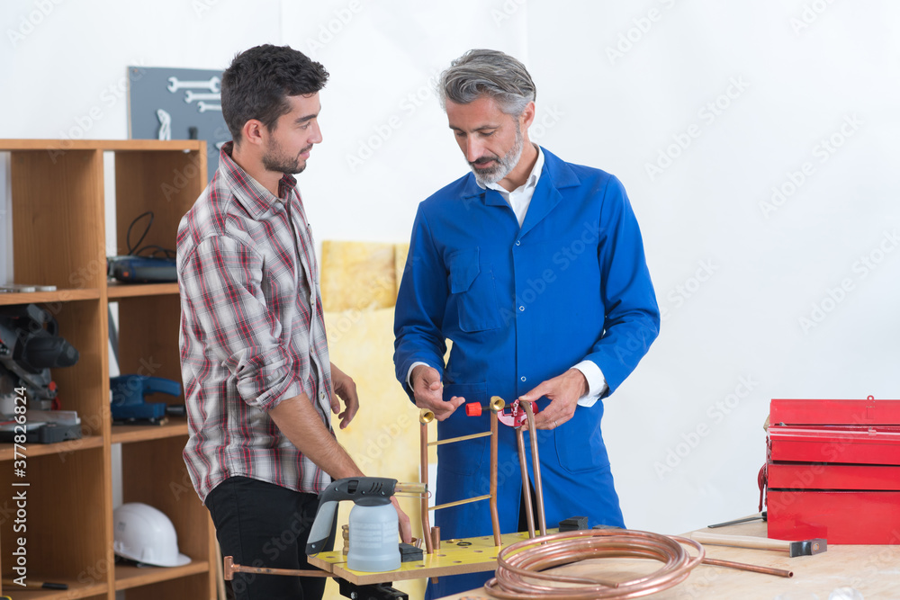 tradesman training apprentice to weld copper pipe tradesman training apprentice to weld copper pipe