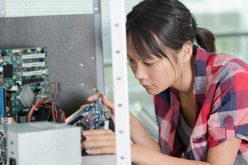 female engineer working with circuits