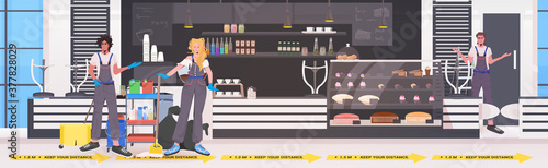 professional cleaners mix race janitors team cleaning and disinfecting floor to prevent coronavirus pandemic modern cafe interior horizontal full length vector illustration
