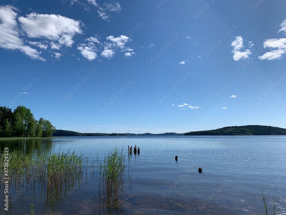Blue lake and sky background