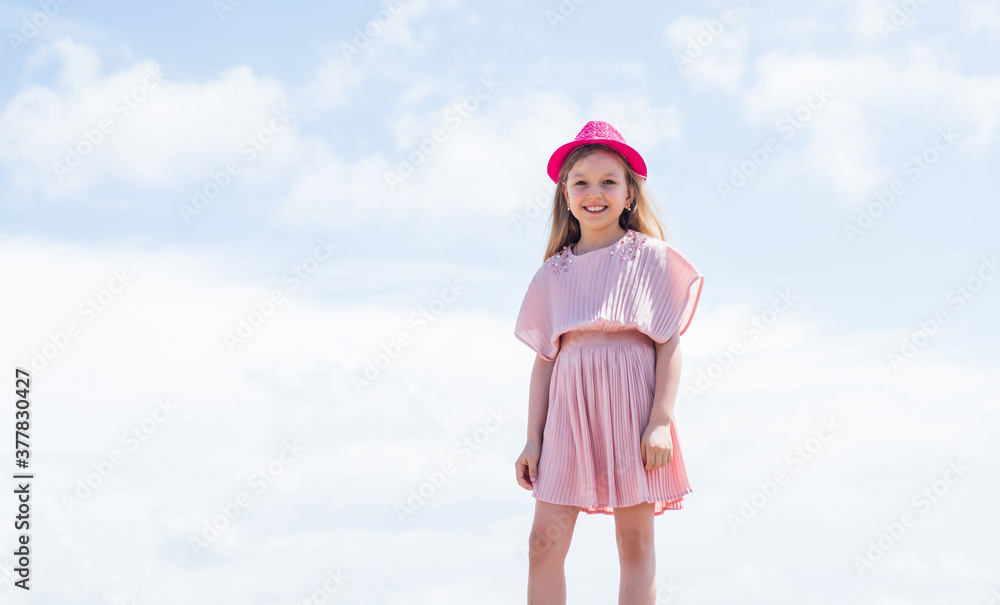 Pure beauty. looking so stylish. perfect summer day. kid beauty and fashion. hairdresser beauty salon. childhood happiness. little fashion model. small girl wear dress. child relax outdoor