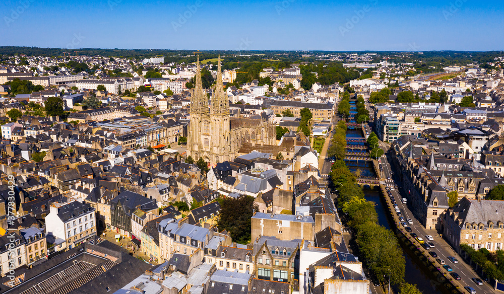 Aerial panoramic view of French commune of Quimper looking out over Gothic building of Cathedral of Saint Corentin, Finistere, Brittany..