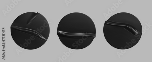 Black glued round crumpled sticker mockup set. Adhesive clear black paper or plastic stickers label with glued, wrinkled effect on grey background. Templates label or price tags. 3d realistic vector