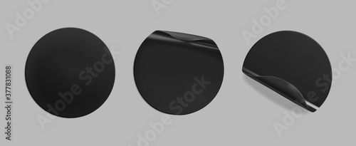 Black glued round crumpled sticker mockup set. Adhesive clear black paper or plastic stickers label with glued, wrinkled effect on grey background. Templates label or price tags. 3d realistic vector