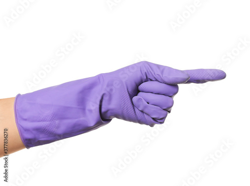 Hand in rubber glove pointing at something on white background