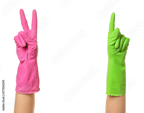 Gesturing hands in rubber gloves on white background