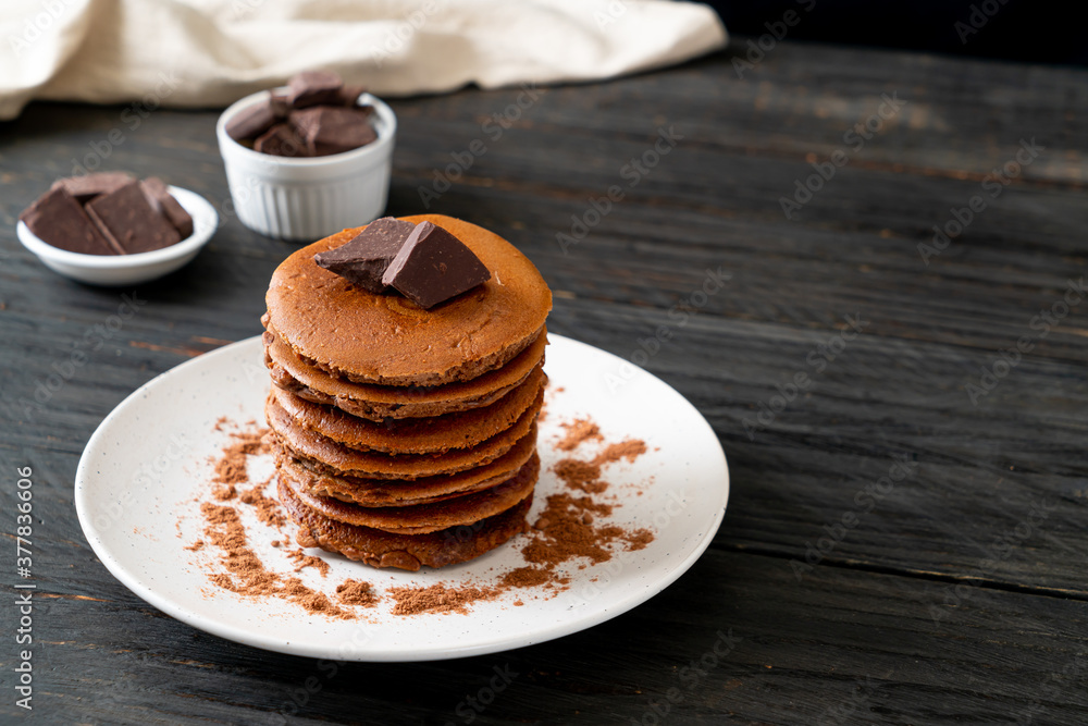 chocolate pancake stack on plate chocolate pancake stack on plate