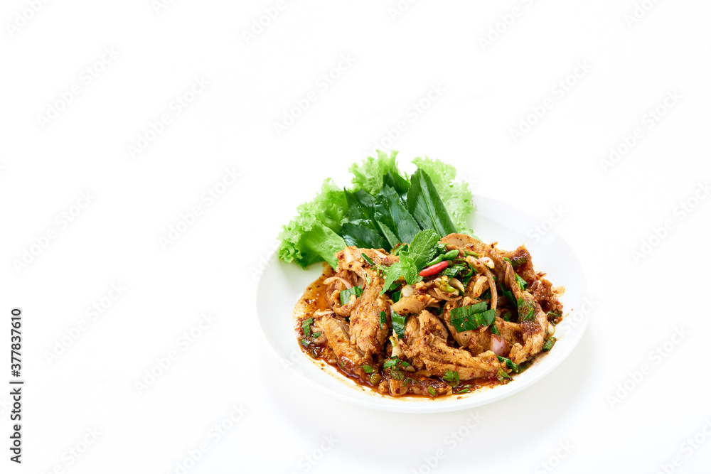 Spicy grilled pork neck salad served with fresh vegetable Spicy grilled pork neck salad served with fresh vegetable