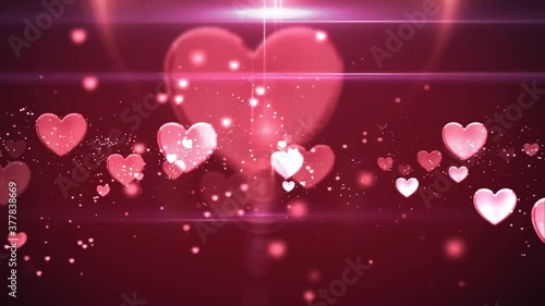 Beautiful pink blinking hearts fading and sparkling in dark pink background - animation photo