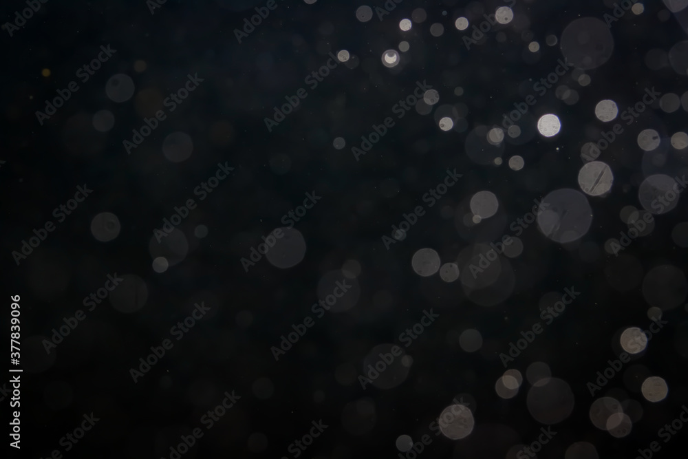 Fantasy bokeh sparkle from light on black Fantasy bokeh sparkle from light on black