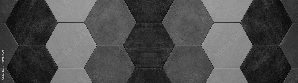 Abstract seamless dark black gray grey anthracite concrete cement stone tile wall made of hexagonal geometric hexagon print texture background banner panorama - obrazy, fototapety, plakaty 
