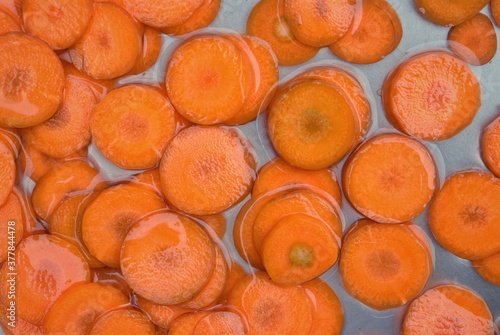 Carrot Slices in Water, Perfect for Wallpaper