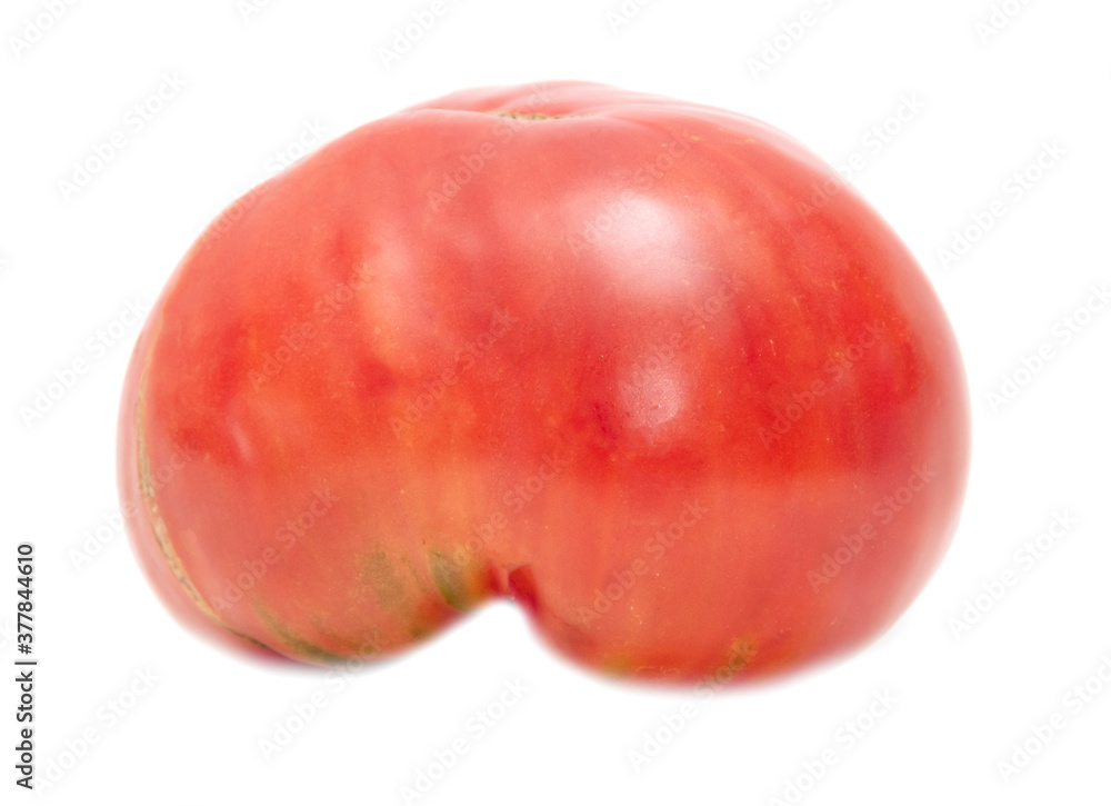 Fototapeta premium Red ripe tomato isolated on a white background.