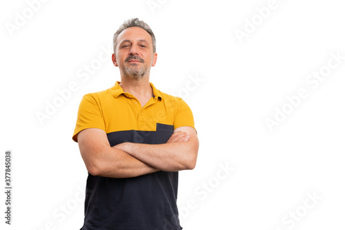 White male wearing summer clothes with crossed arms and copyspace