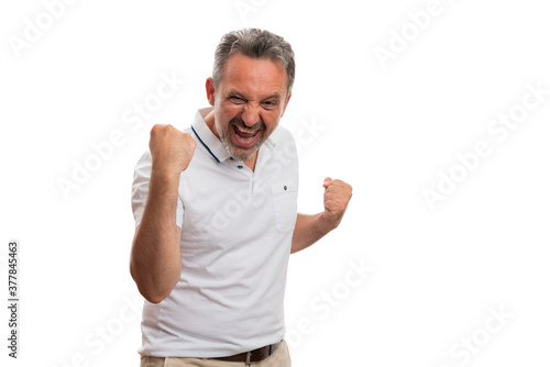 Male celebrating success using fists gesture with happy expression