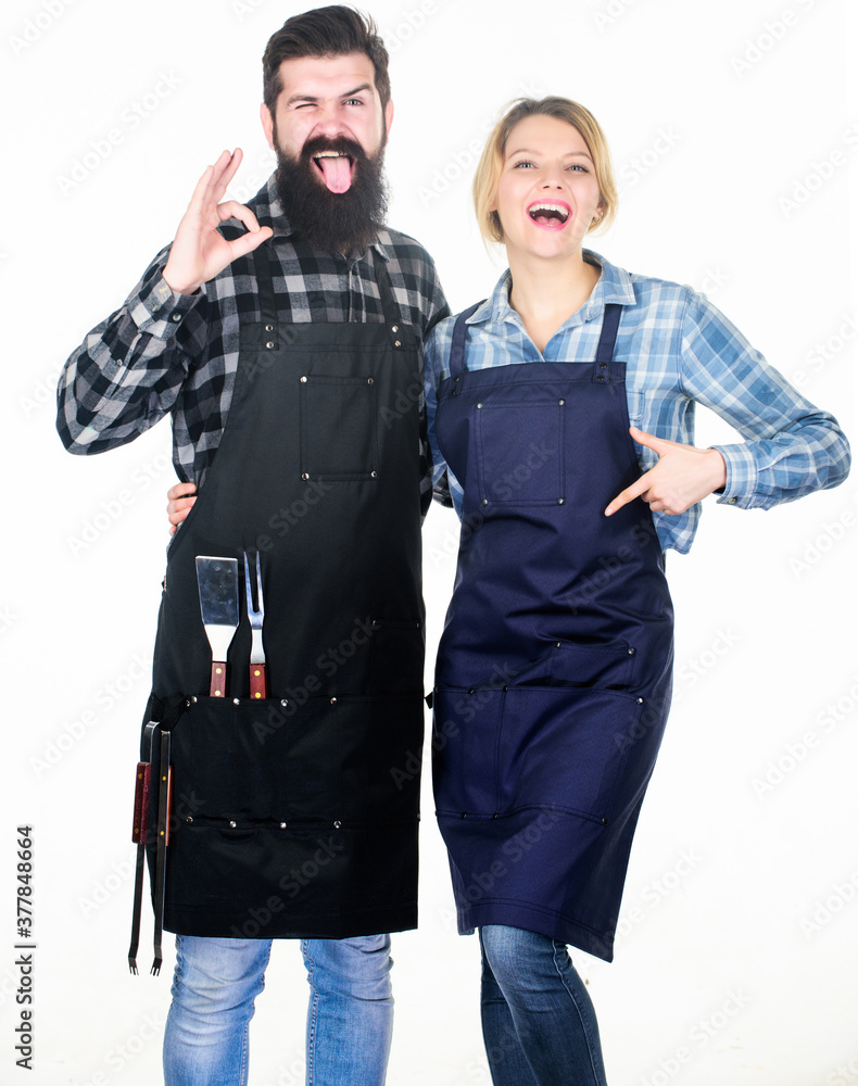 Tools for roasting meat. Couple in love hold kitchen utensils. Man bearded hipster and girl. Preparation and culinary. Picnic barbecue. food cooking recipe. Family weekend. So yummy Tools for roasting meat. Couple in love hold kitchen utensils. Man bearded hipster and girl. Preparation and culinary. Picnic barbecue. food cooking recipe. Family weekend. So yummy