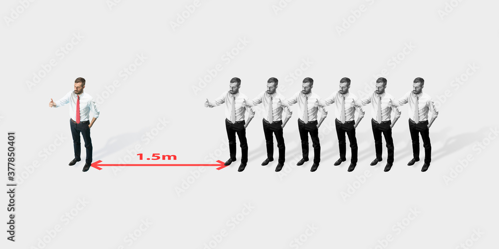 Studio shot of people demonstrating social distancing with arrows indicating the separation. Office workers during coronavirus outbreak with new rules for safety and healthcare. High angle view Studio shot of people demonstrating social distancing with arrows indicating the separation. Office workers during coronavirus outbreak with new rules for safety and healthcare. High angle view