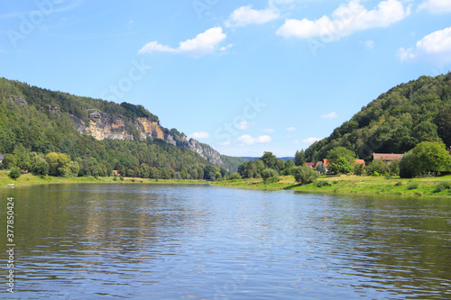 View from the town Wehlen to Elbe river with the "Bastei" in Background, Saxon Switzerland - Germany