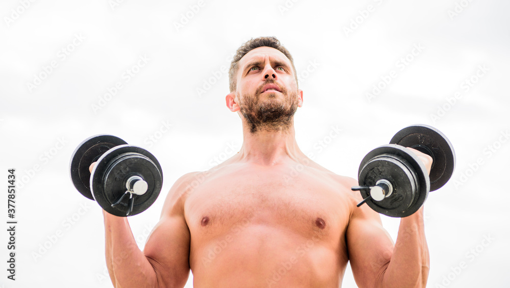 Doing his best. man sportsman with strong ab torso. steroids. fitness and sport equipment. Muscular man exercising with barbell. athletic body. Dumbbell gym. success. Perfect six pack