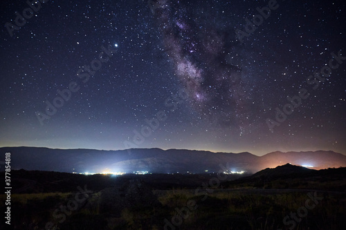 Starry night with the Milky Way over some mountains