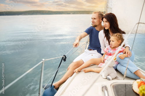 happy family sailing on boat © alter_photo