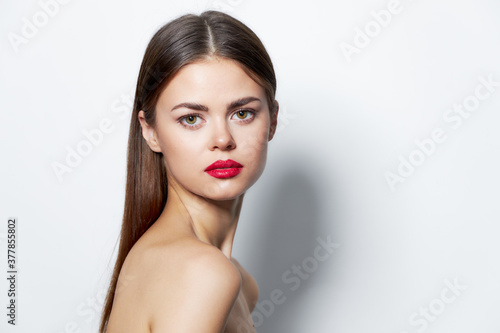 Woman skin care naked shoulders red lips spa treatments 