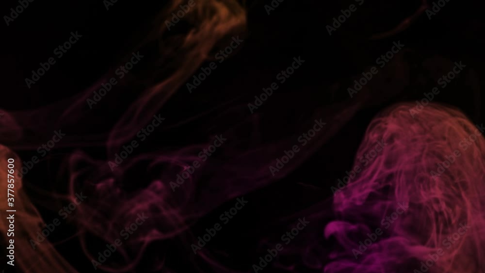 Purple and orange smoke appearing and disappearing in black background - animation Purple and orange smoke appearing and disappearing in black background - animation